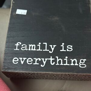 Black Wooden Sign with White Text